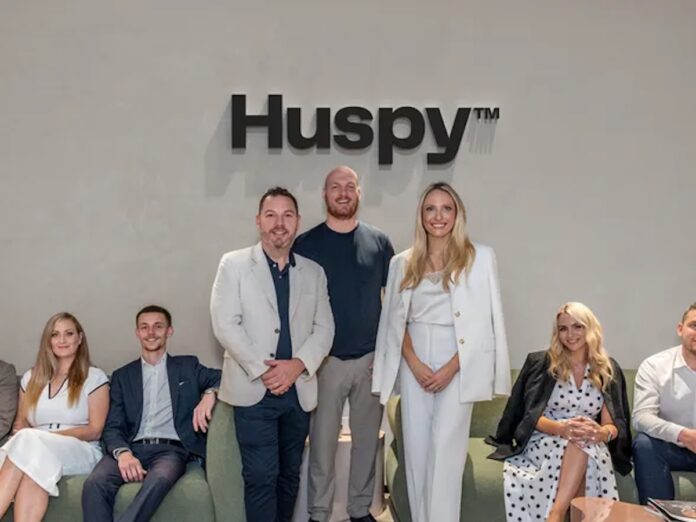 Left to right: Patrick Hayden, Founder, LuxuryX, Mark Castley, CEO of Real Estate, Huspy and Georgia Peacock, with members of the LuxuryX team | AI PropTech News